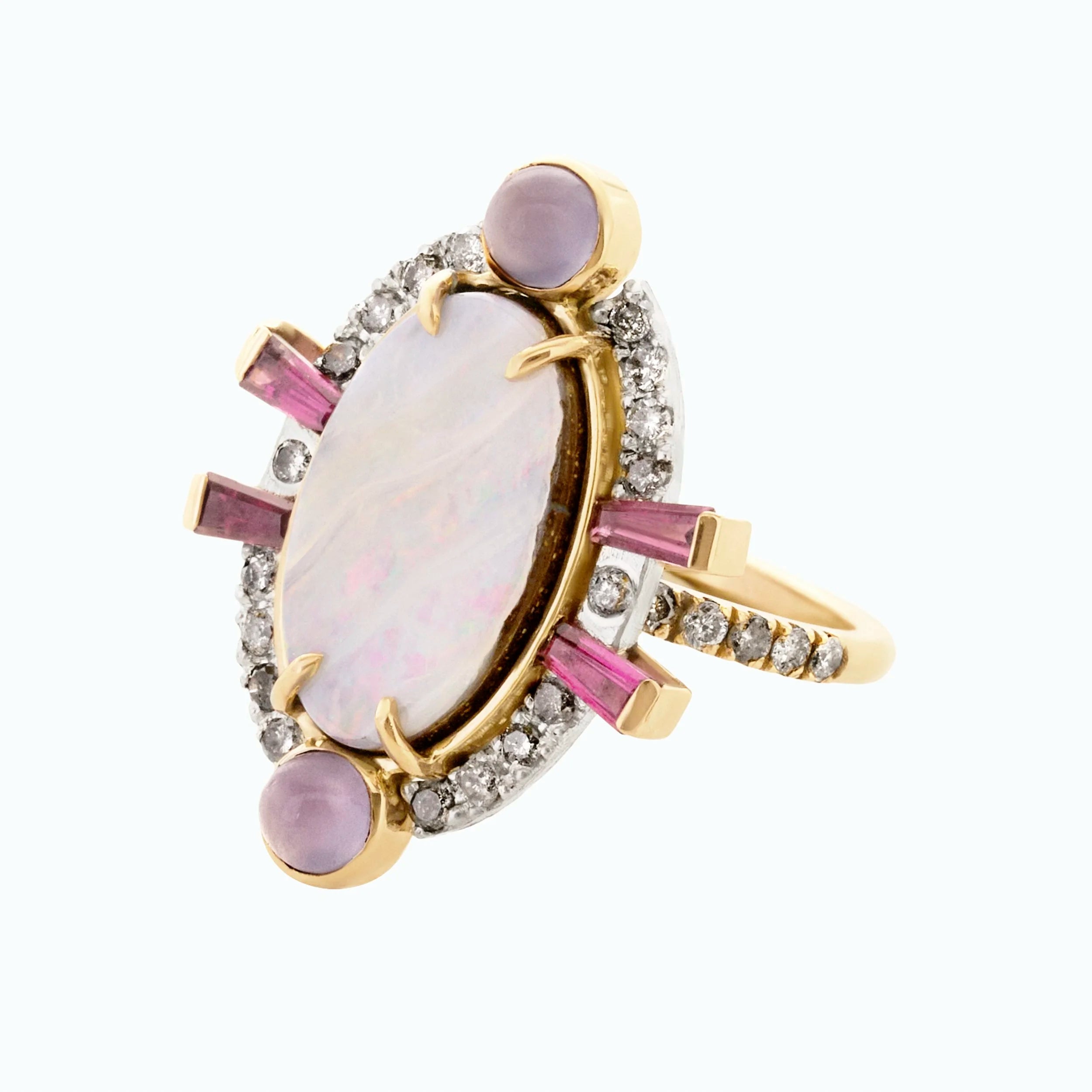 Gold ring with pink gemstones and a central opal on a white background