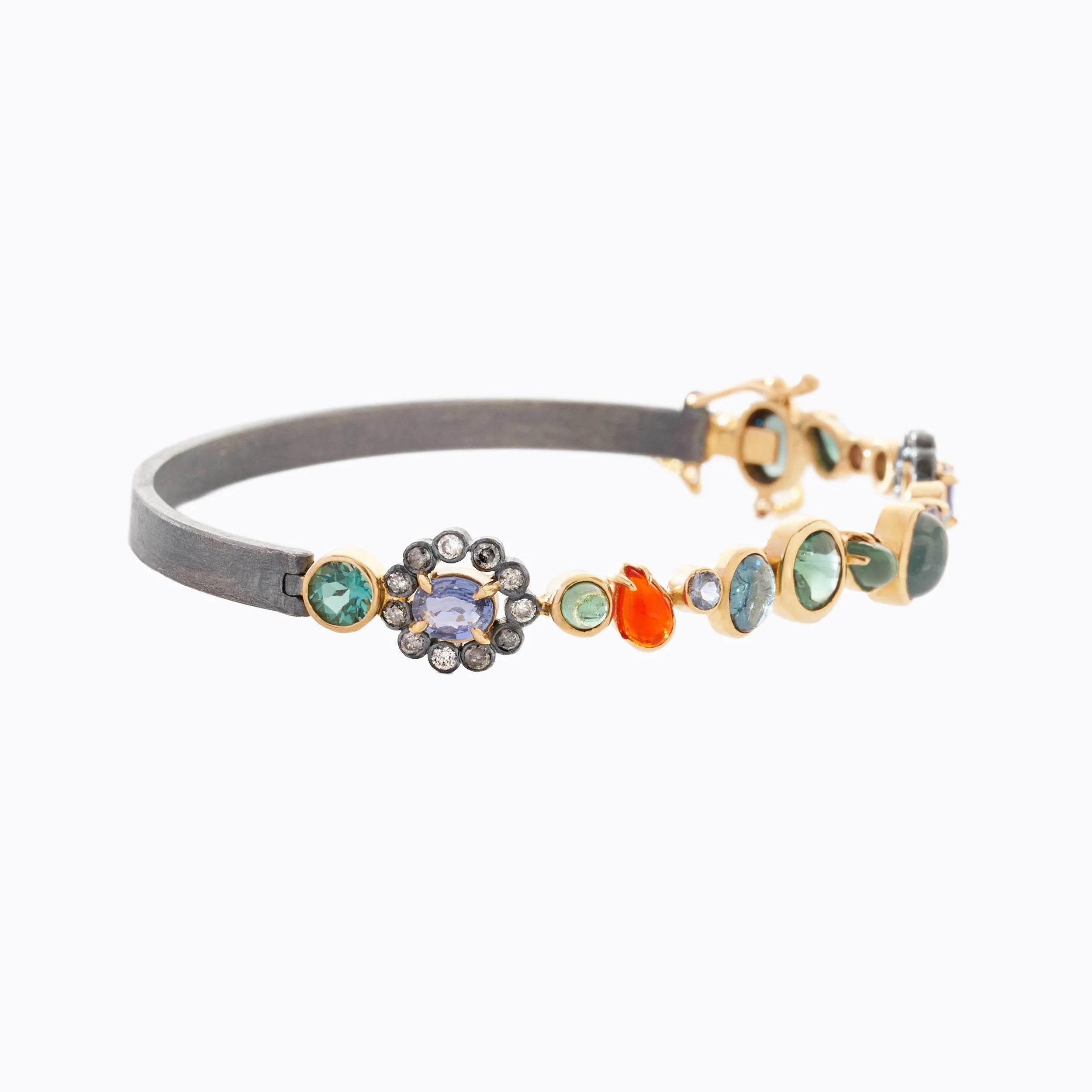 Multicolored gemstone cuff on a white background