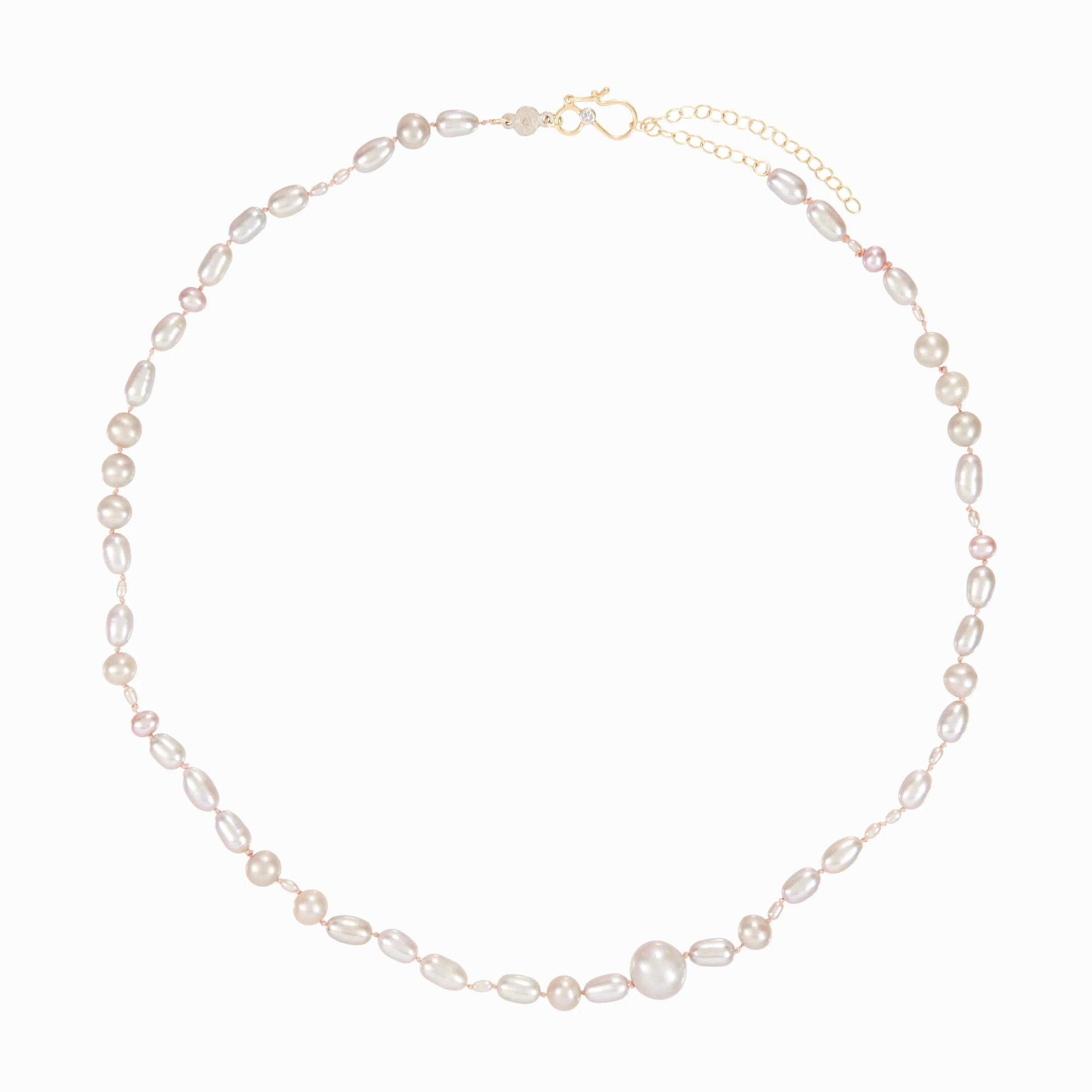 Pearl necklace on a white background