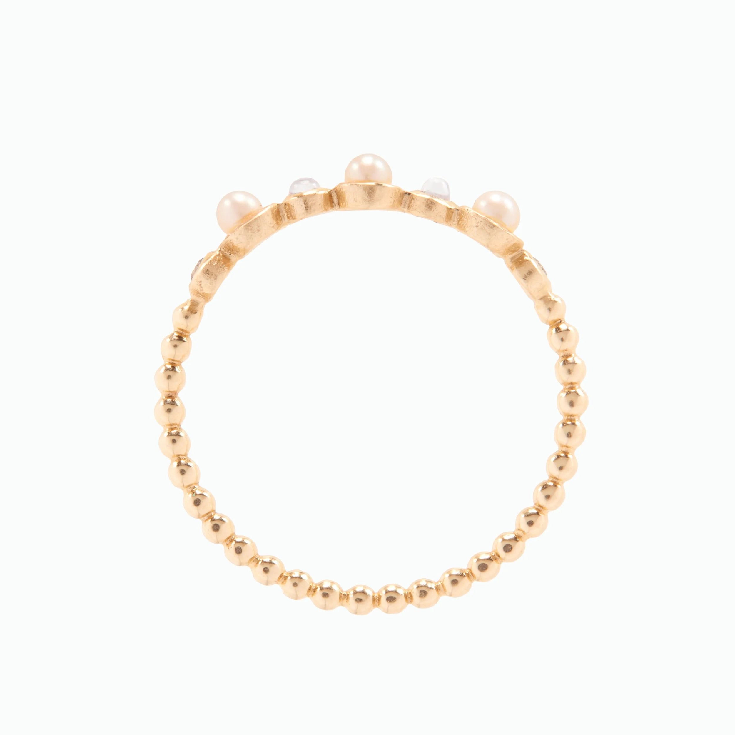 Gold beaded ring with pearls on a white background