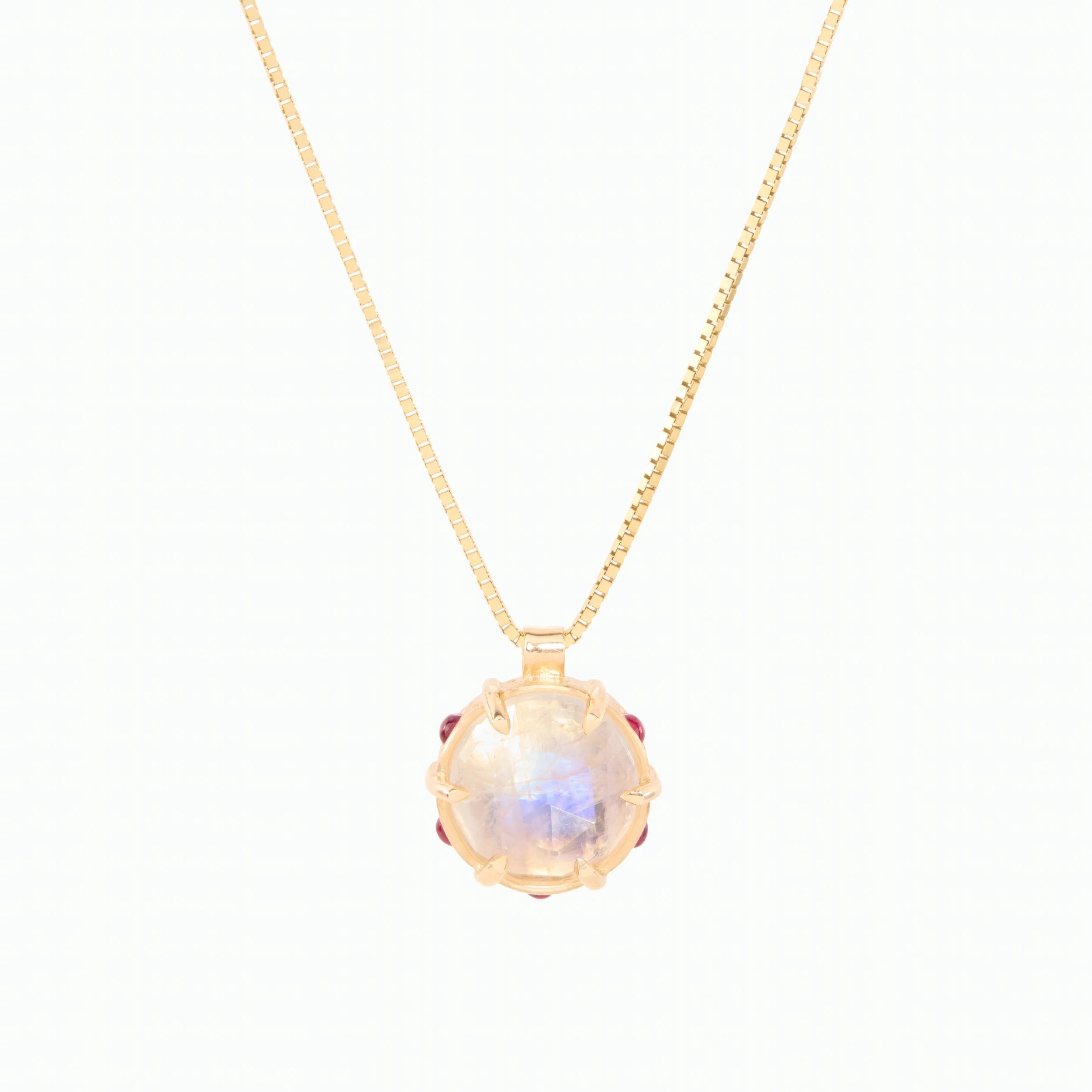 Necklace with a pendant featuring a rainbow moonstone on a white background