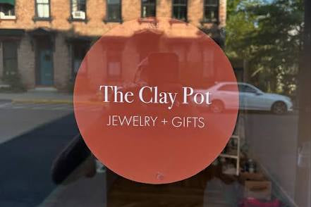 Photo of The Clay Pot Jewelry and Gifts window sticker logo