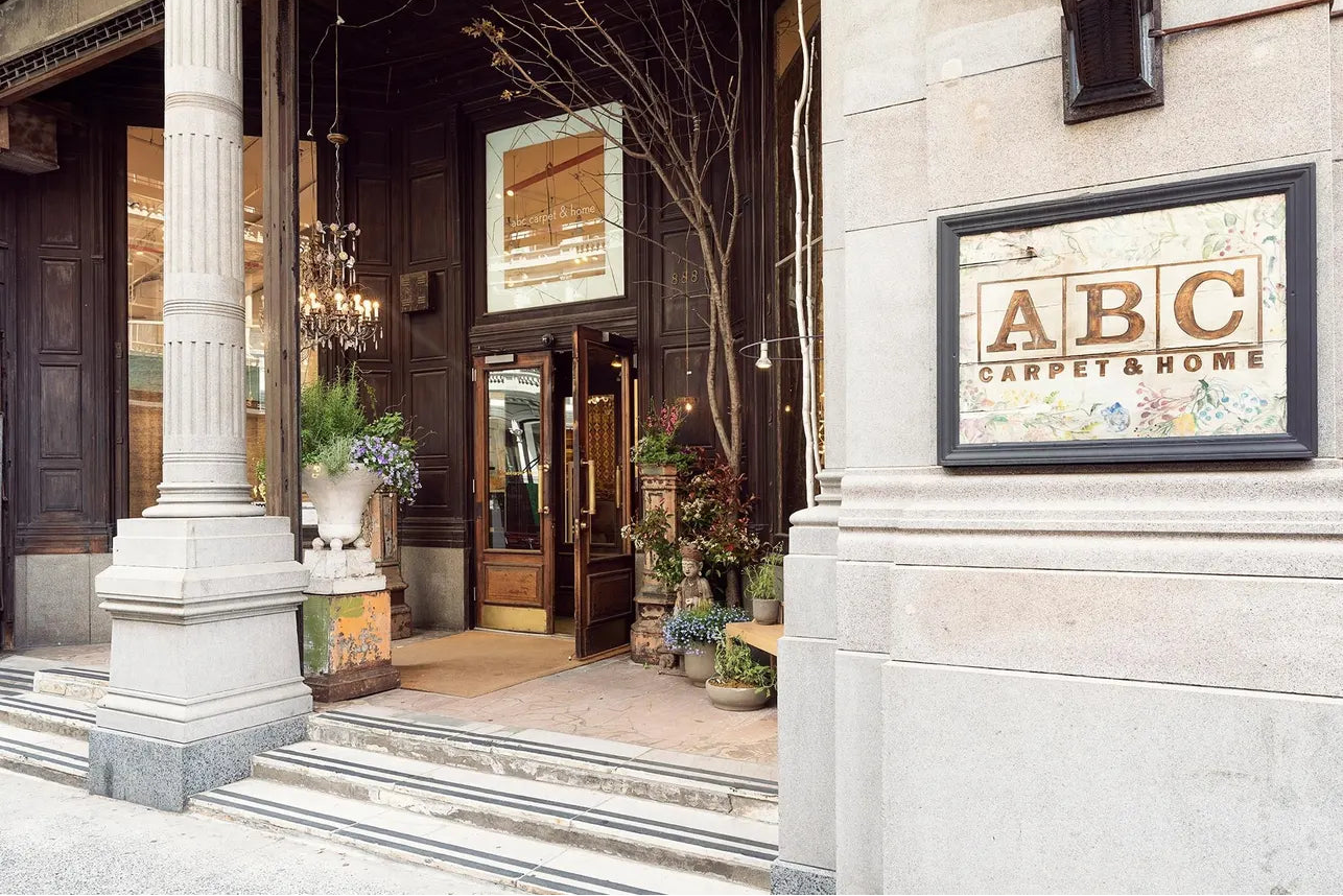 Decorative entrance with a sign reading 'ABC' on a building facade.