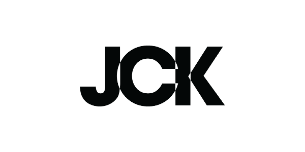 Black 'JCK' logo on a clear background