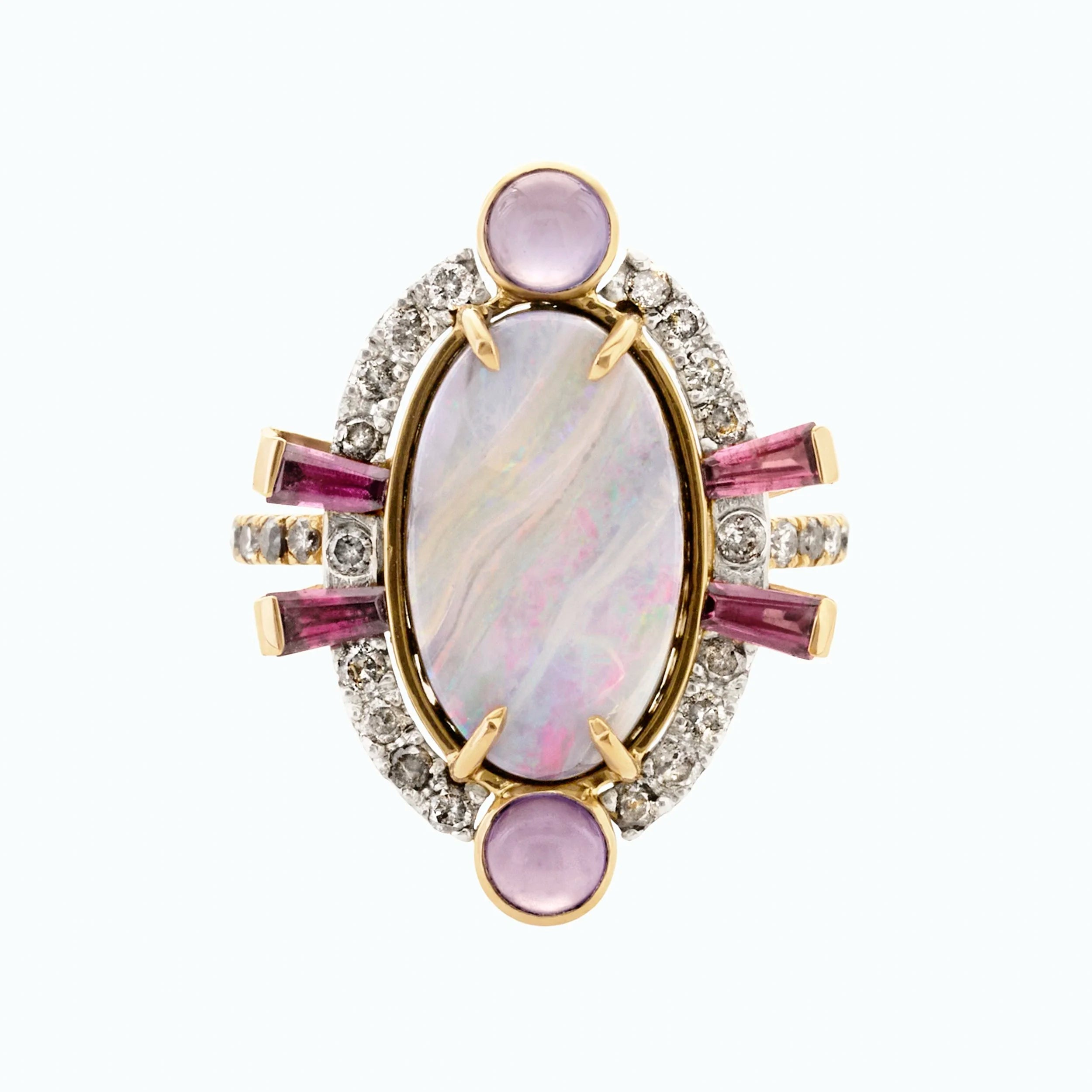 Elegant ring with pink gemstones and gold accents on a white background