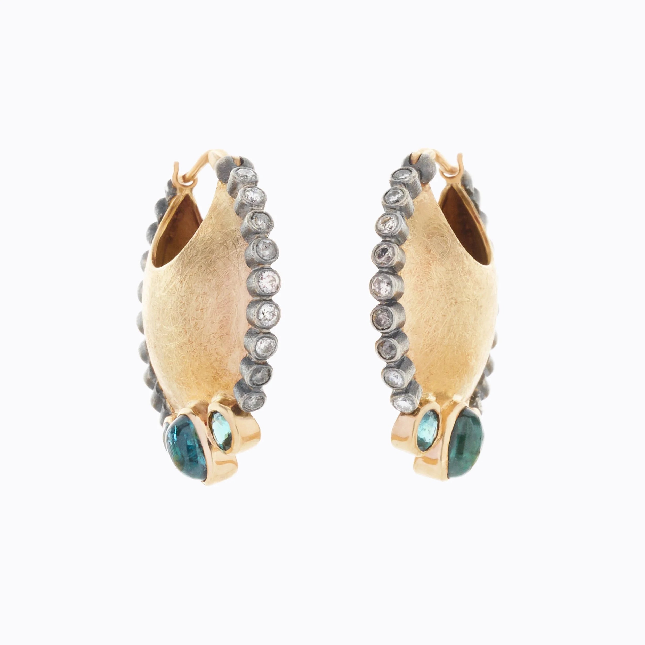 Gold hoop earrings with gemstone accents on a white background