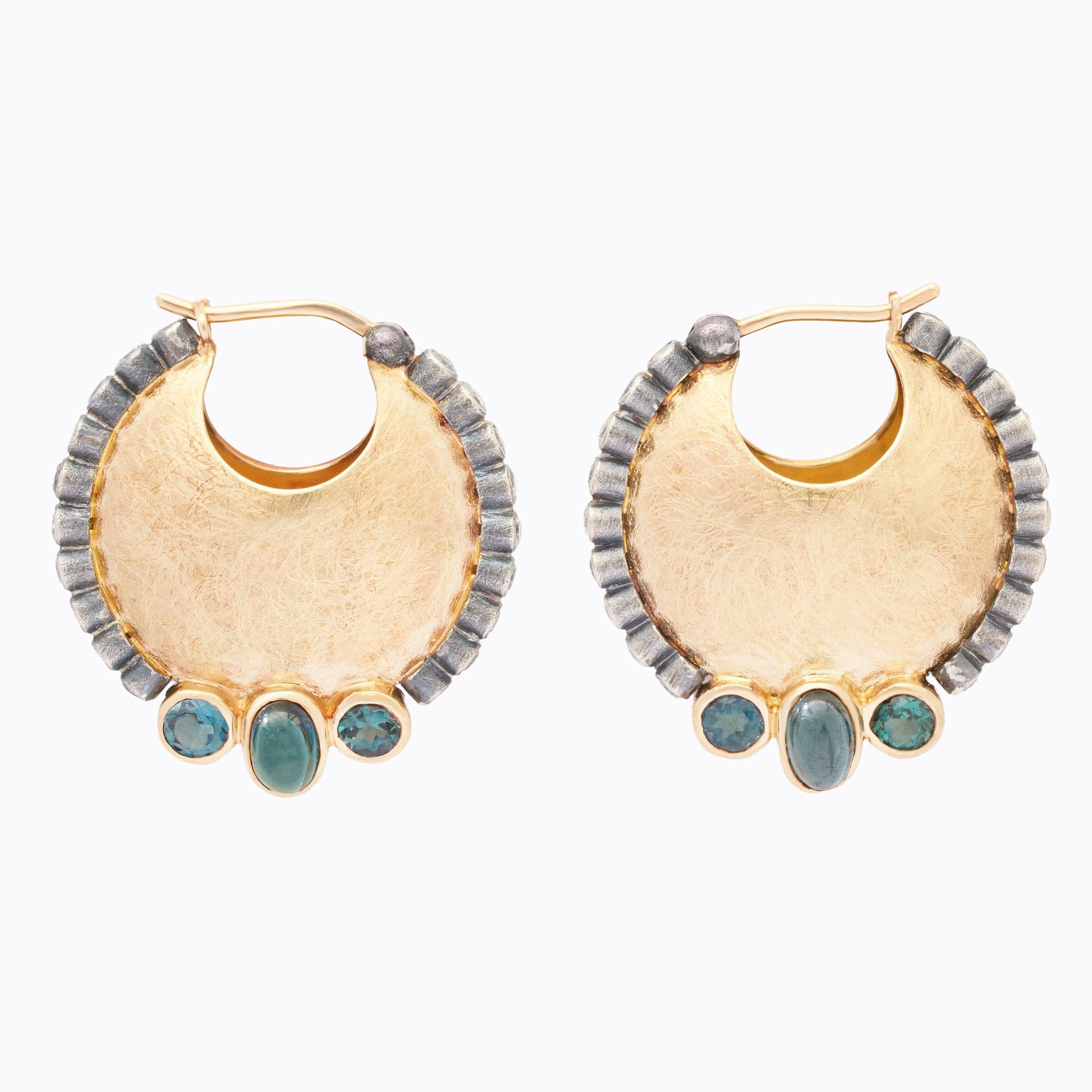 Gold hoop earrings with diamond and blue accents on a white background