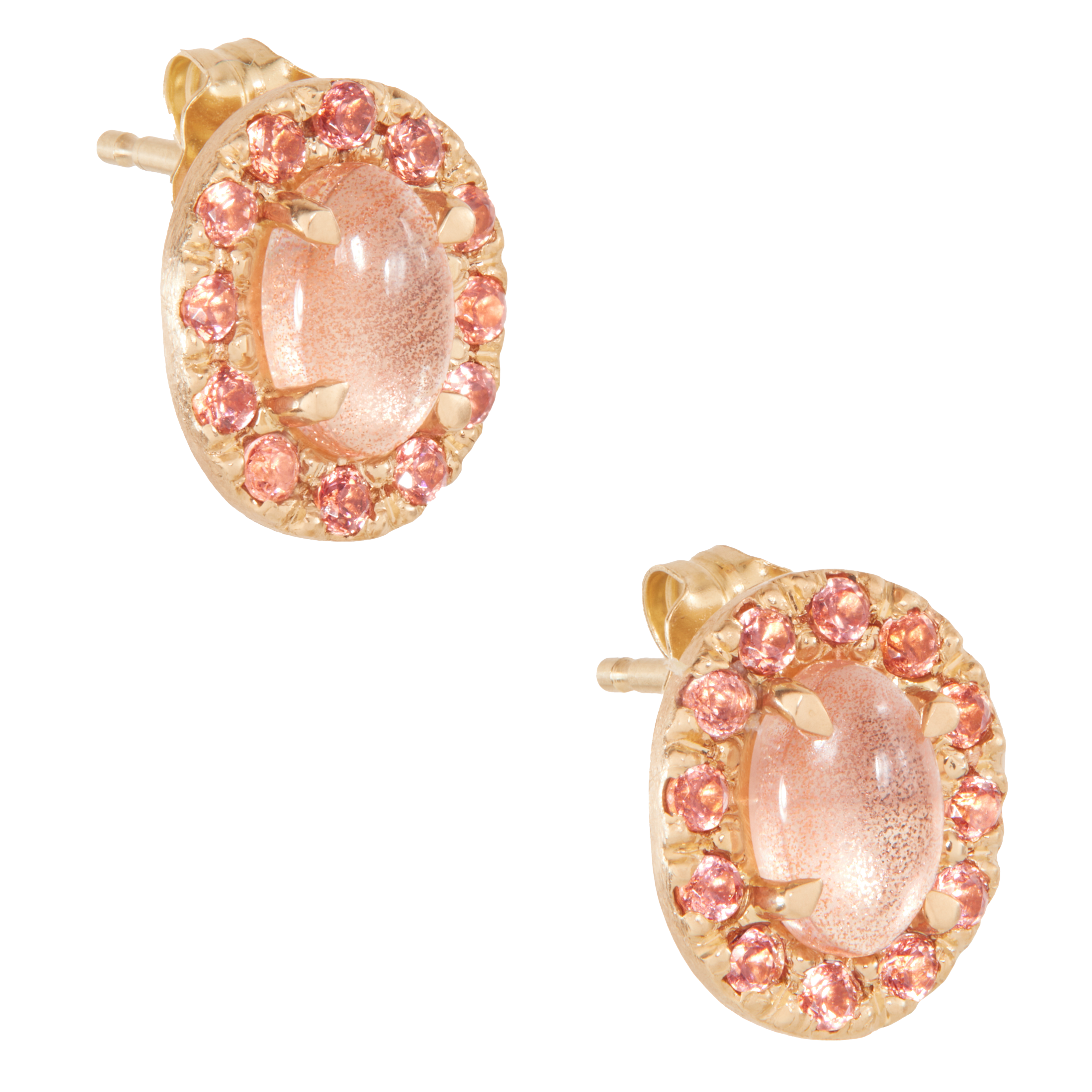 Pair of gold earrings with pink gemstones on a white background