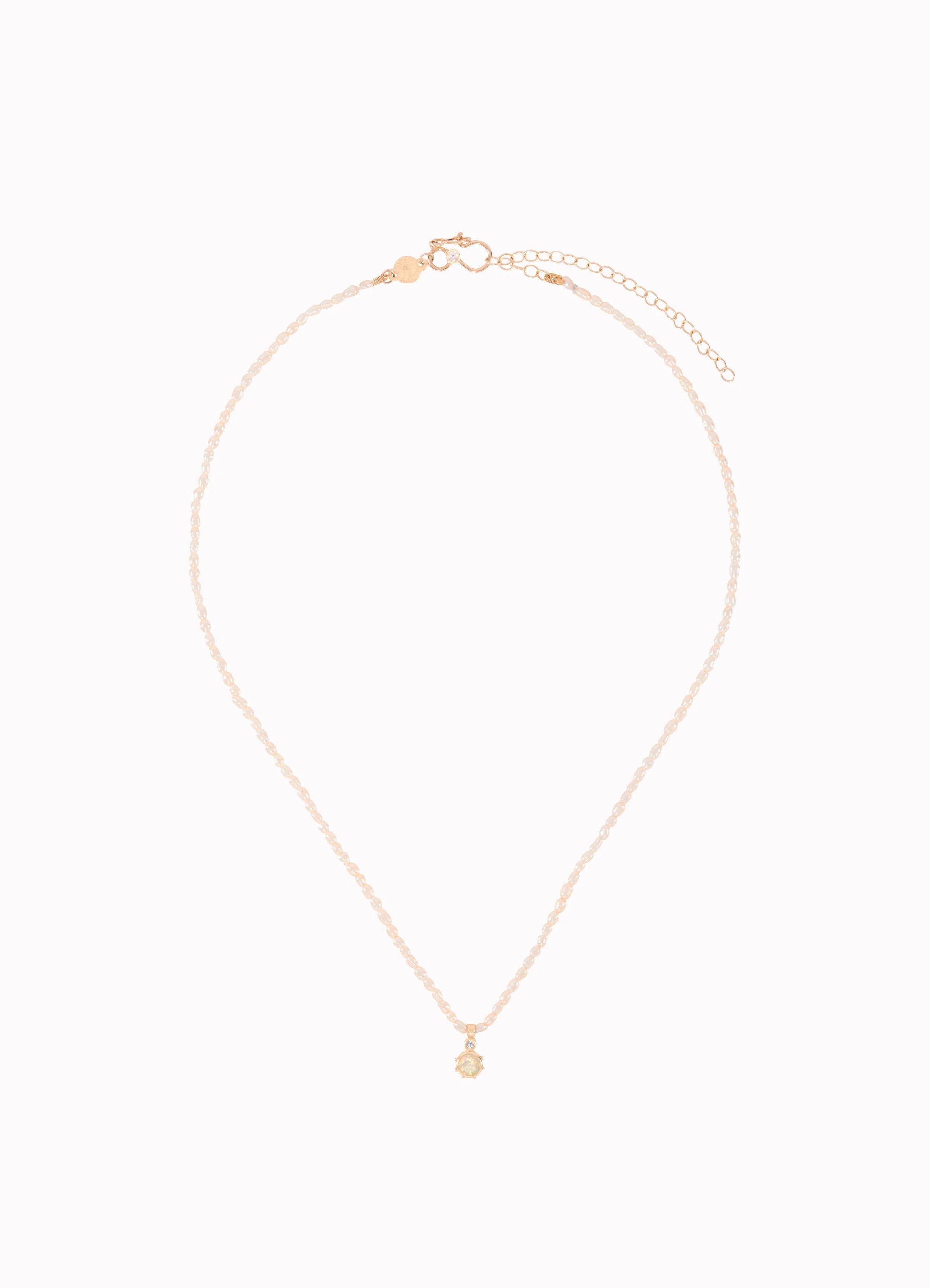 Gold necklace on a white background