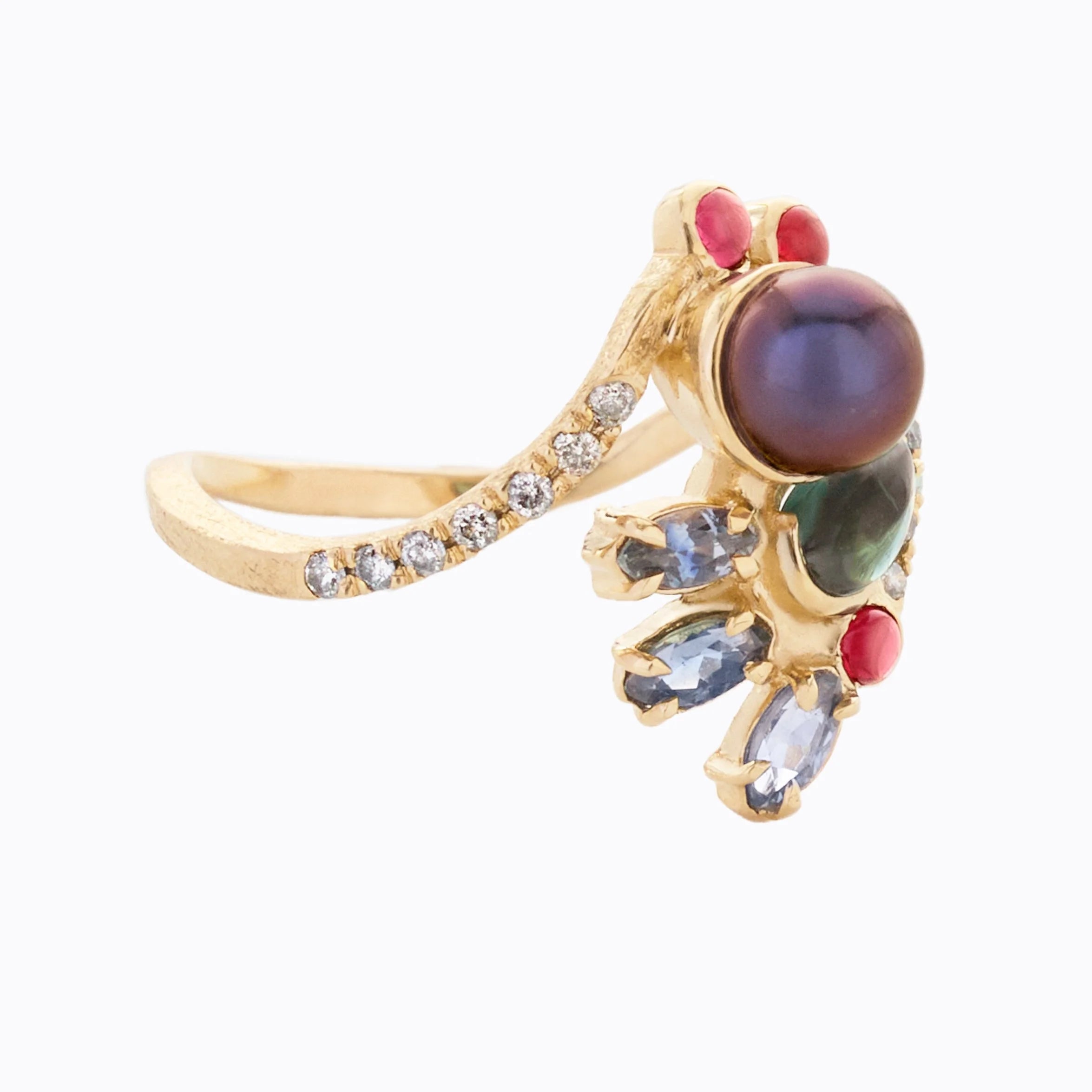 Gold ring with colorful gemstones on a white background