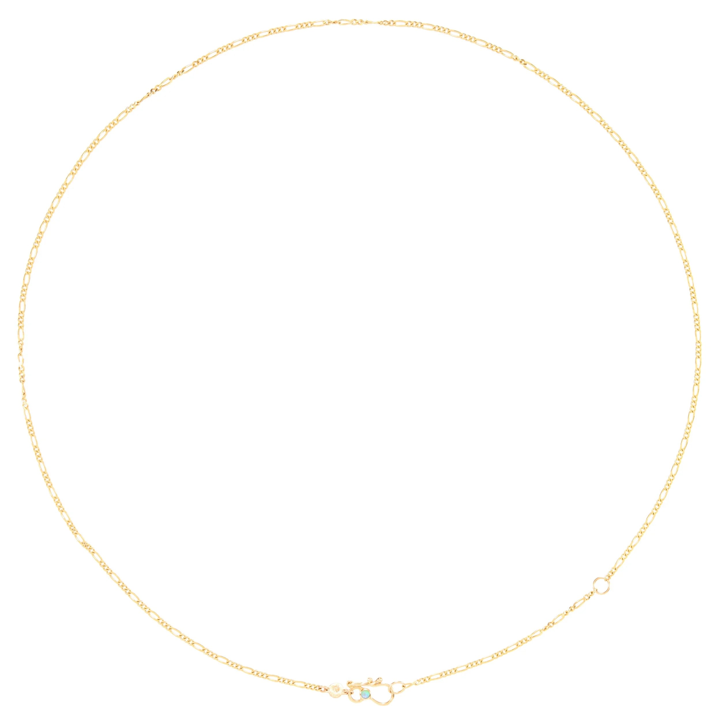 Gold necklace on a white background