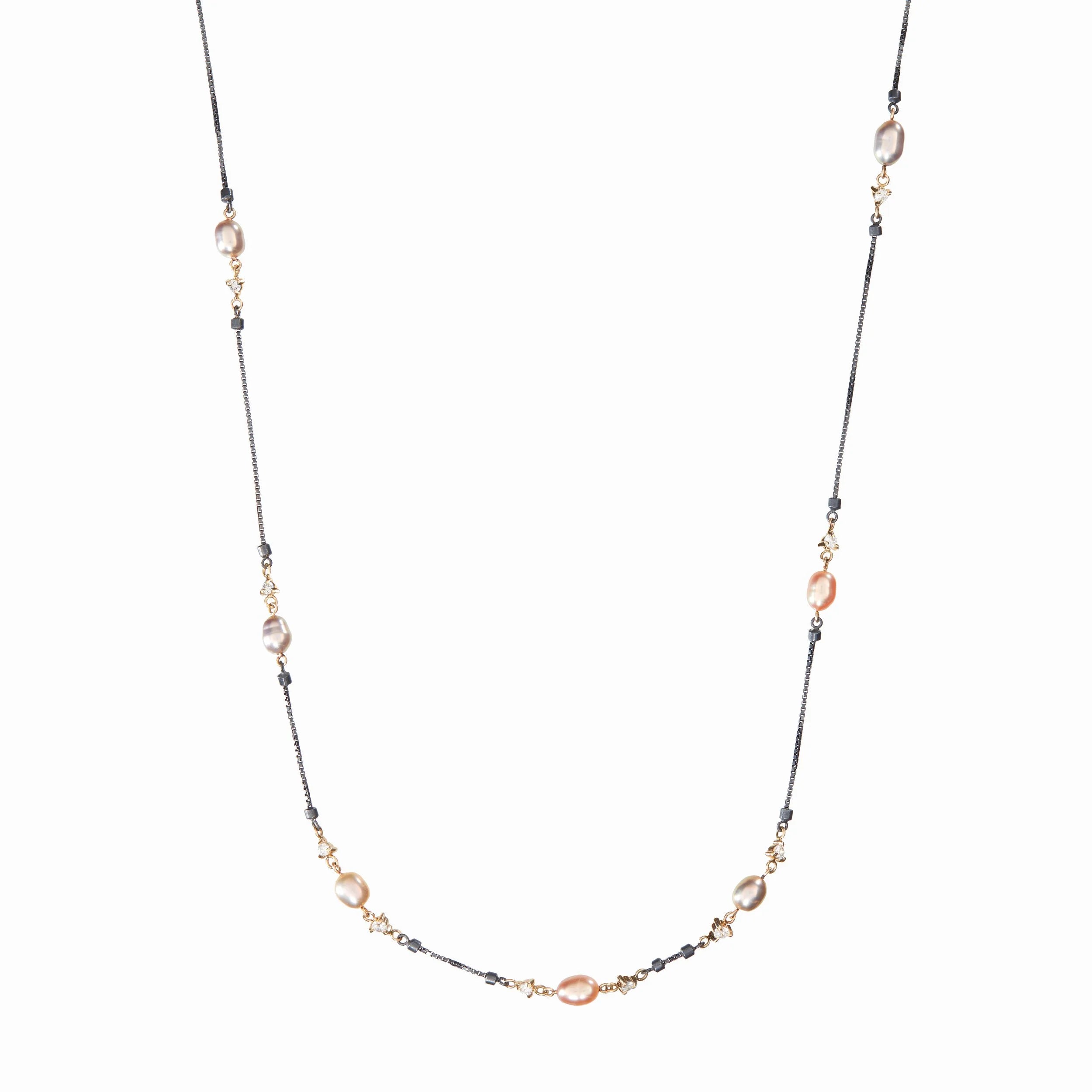 Necklace with pearl beads on a white background